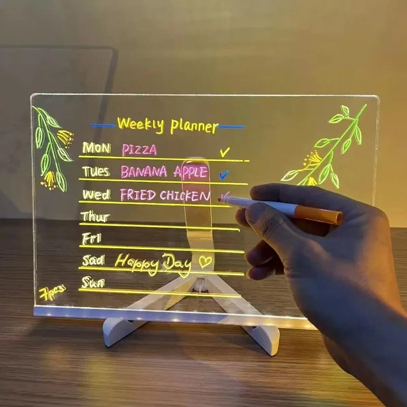 Kids drawing on the DreamGlow LED Drawing Board with neon pens