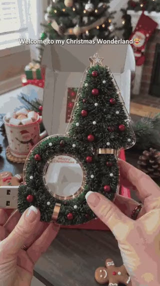 DreamGlow projecting Christmas trees and snowflakes on the ceiling