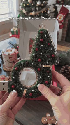 DreamGlow projecting Christmas trees and snowflakes on the ceiling